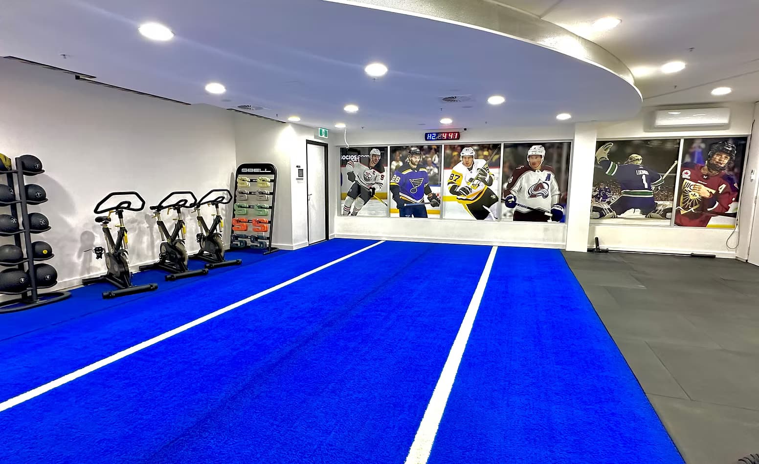 Off-ice sprint turf and weights area